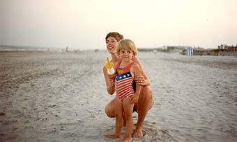 mother and child on beach